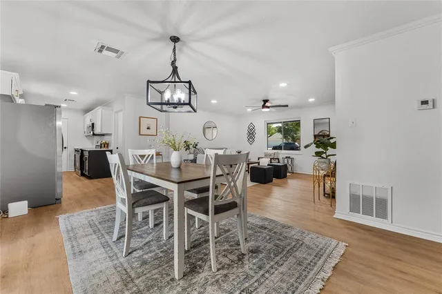 a view of a dining room with furniture