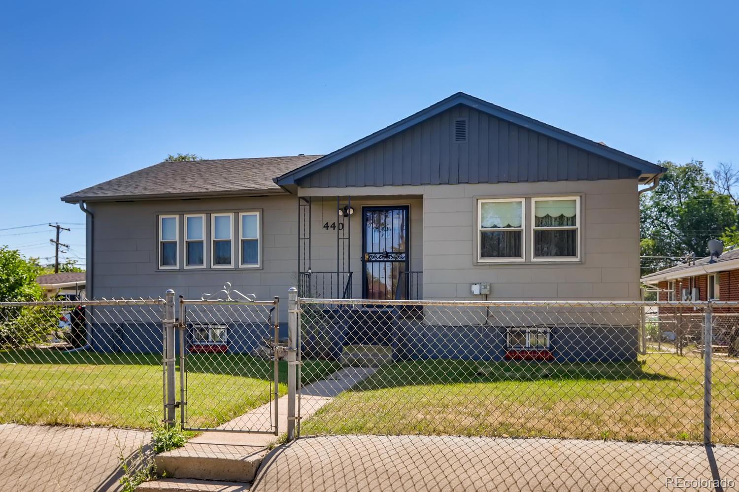 440 South Raleigh Street Denver, CO 80219 - Photo 1 of 29 a view of a house with a swimming pool
