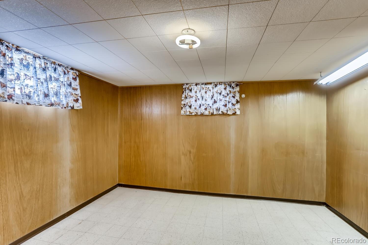 440 South Raleigh Street Denver, CO 80219 - Photo 17 of 29 a view of an empty room with a window