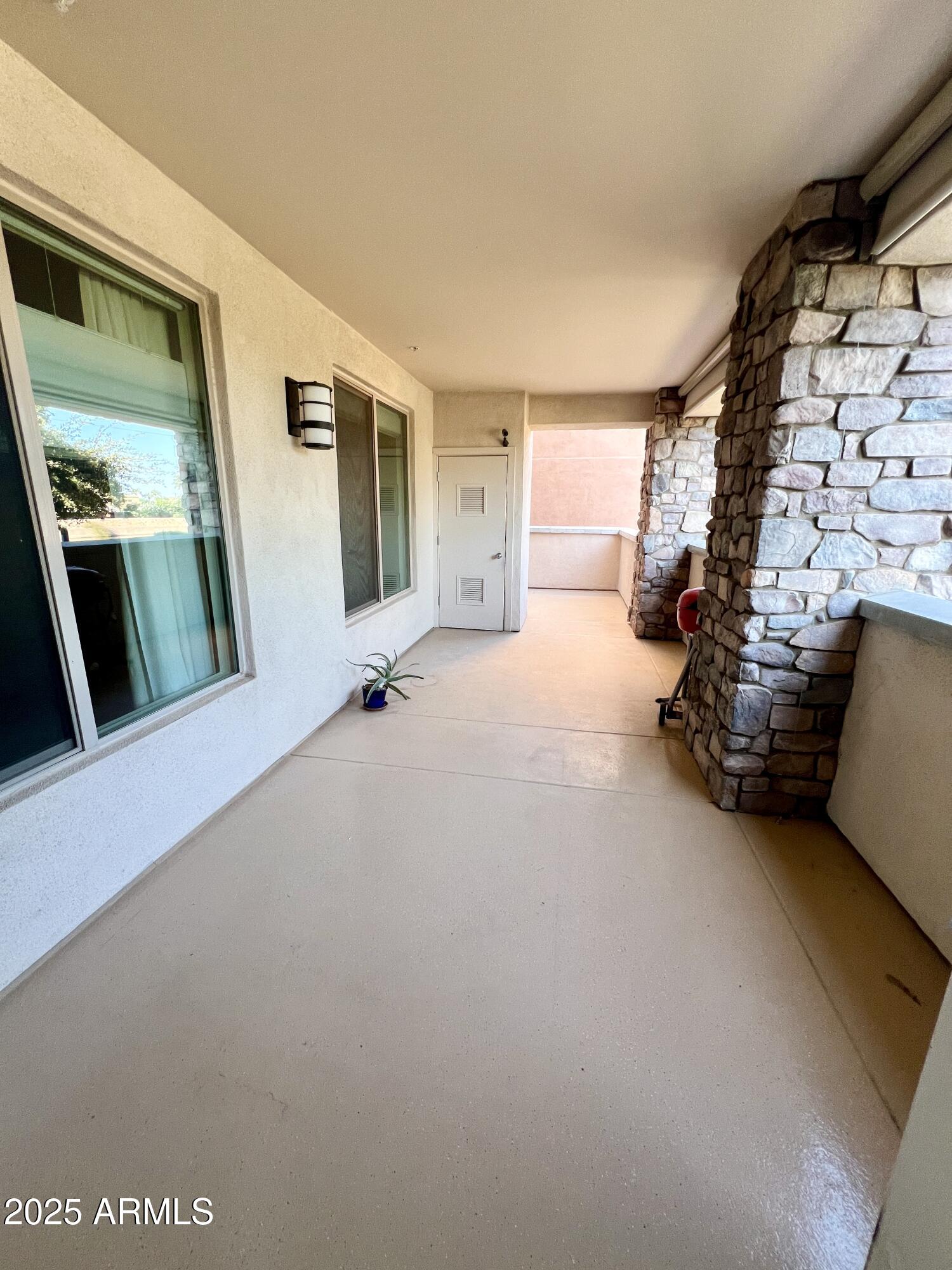 4803 North Woodmere Fairway, Unit 1004 Scottsdale, AZ 85251 - Photo 17 of 21 a view of livingroom with furniture and window