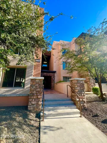 a view of a terrace with chairs