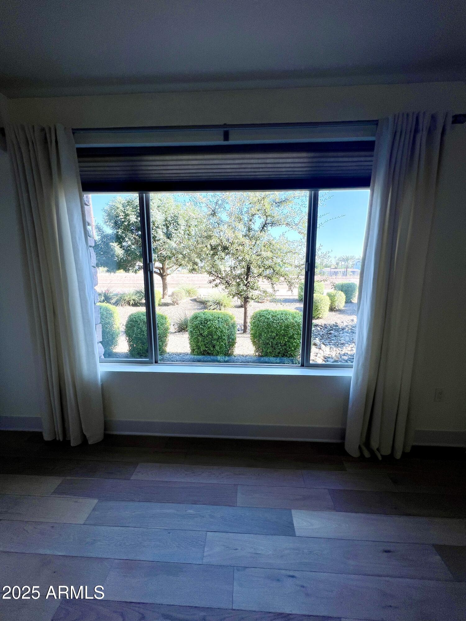 4803 North Woodmere Fairway, Unit 1004 Scottsdale, AZ 85251 - Photo 9 of 21 a view of backyard and window