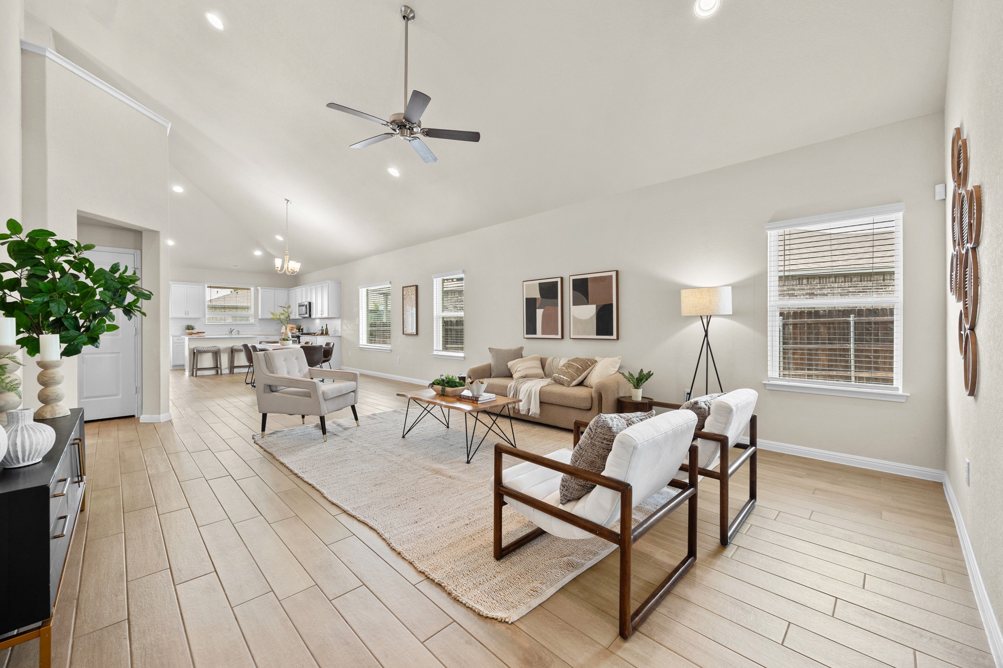 2413 Starhill Ranch Street Georgetown, TX 78628 - Photo 6 of 40 a living room with furniture and a large window