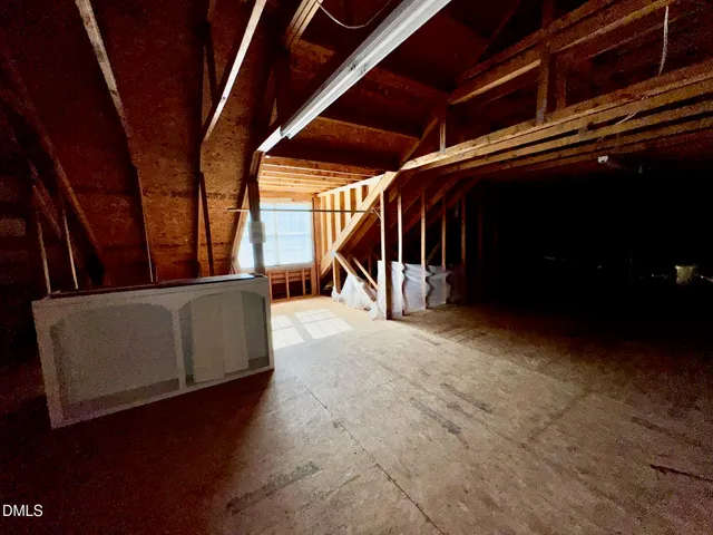 a view of backyard with large windows