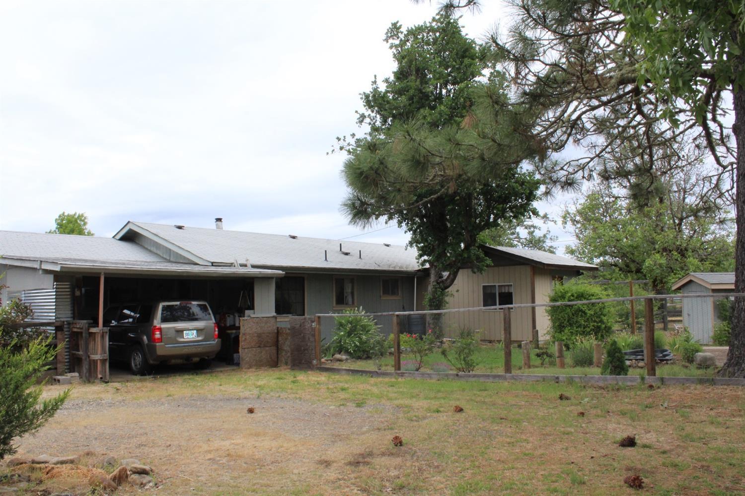 1005 Happy Camp Road Cave Junction, OR 97523 - Photo 20 of 21 Rear of home showing carport and storage