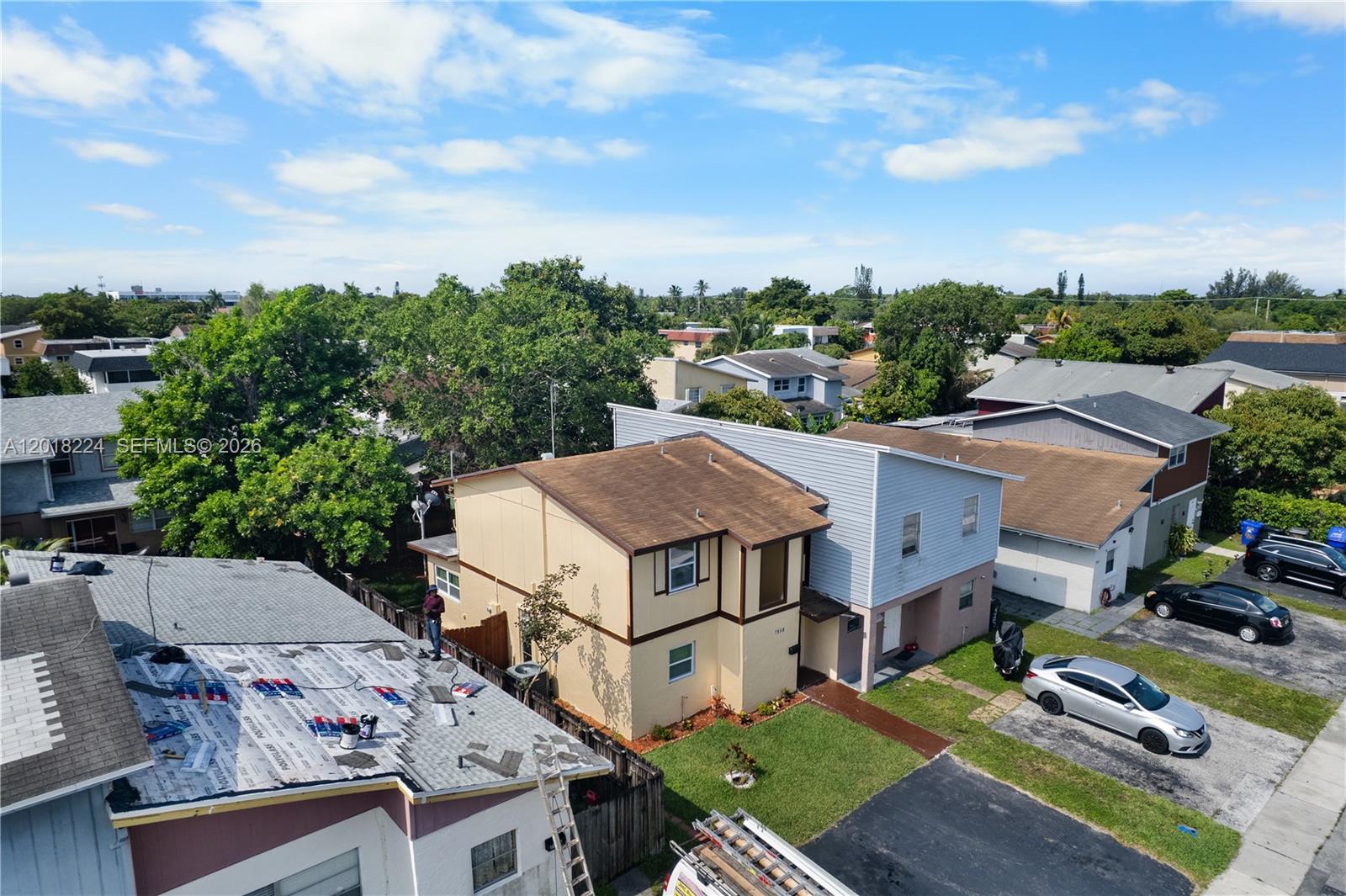 7958 Southwest 6th Street Pompano Beach, FL 33068 - Photo 48 of 57 a aerial view of a house with swimming pool and big trees