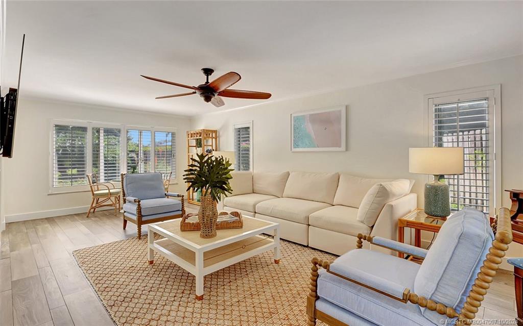 26 Rio Vista Drive Stuart, FL 34996 - Photo 13 of 58 a living room with furniture a window and a table
