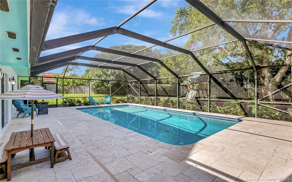 26 Rio Vista Drive Stuart, FL 34996 - Photo 54 of 58 a view of indoor pool and sitting area