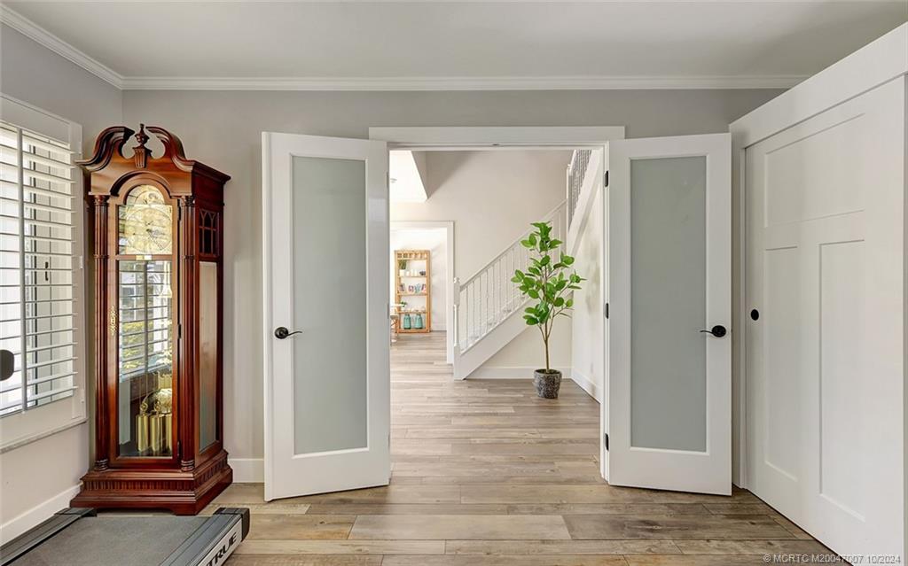 26 Rio Vista Drive Stuart, FL 34996 - Photo 8 of 58 a view of entryway with wooden floor
