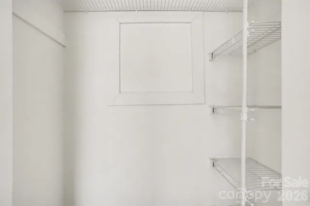 a view of a sign board with a street