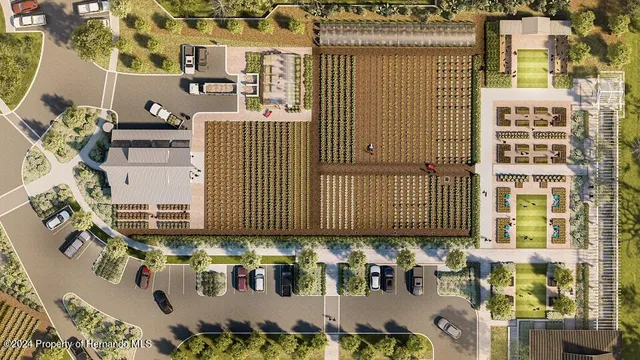 an aerial view of a house with a swimming pool