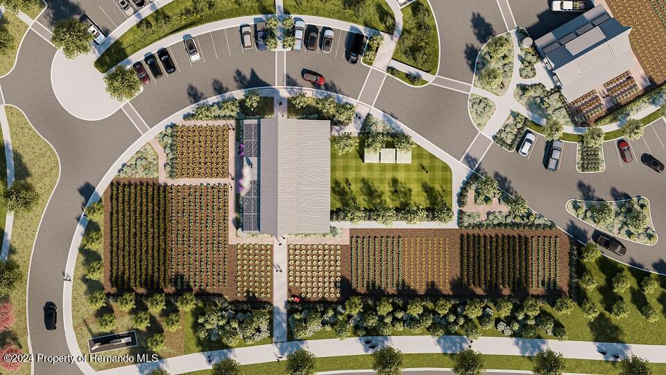 11095 Wishing Cloud Road Land O Lakes, FL 34638 - Photo 12 of 12 an aerial view of a house with a swimming pool