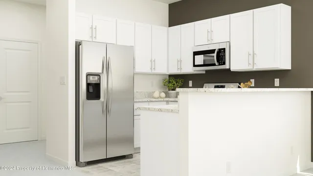 a front view of a house with patio