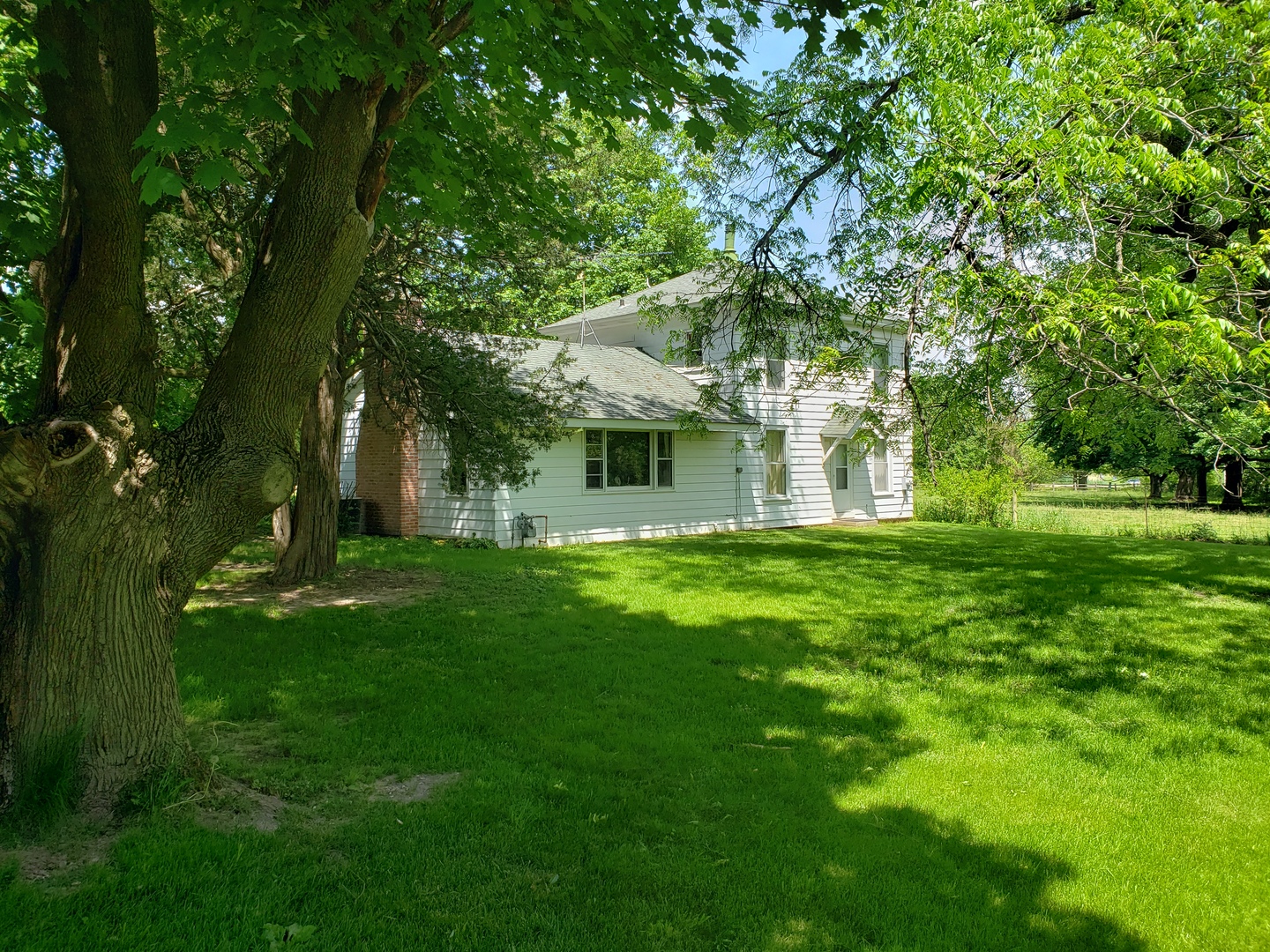 7120 A Tryon Grove Road Richmond, IL 60071 - Photo 1 of 23 a view of a house with yard and tree s