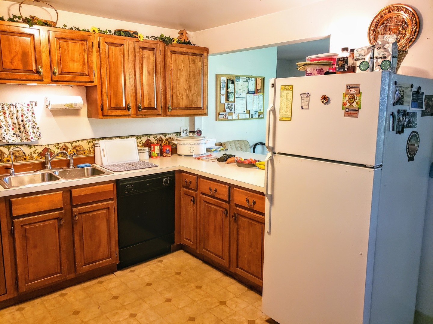 7120 A Tryon Grove Road Richmond, IL 60071 - Photo 7 of 23 a kitchen with a refrigerator and a sink