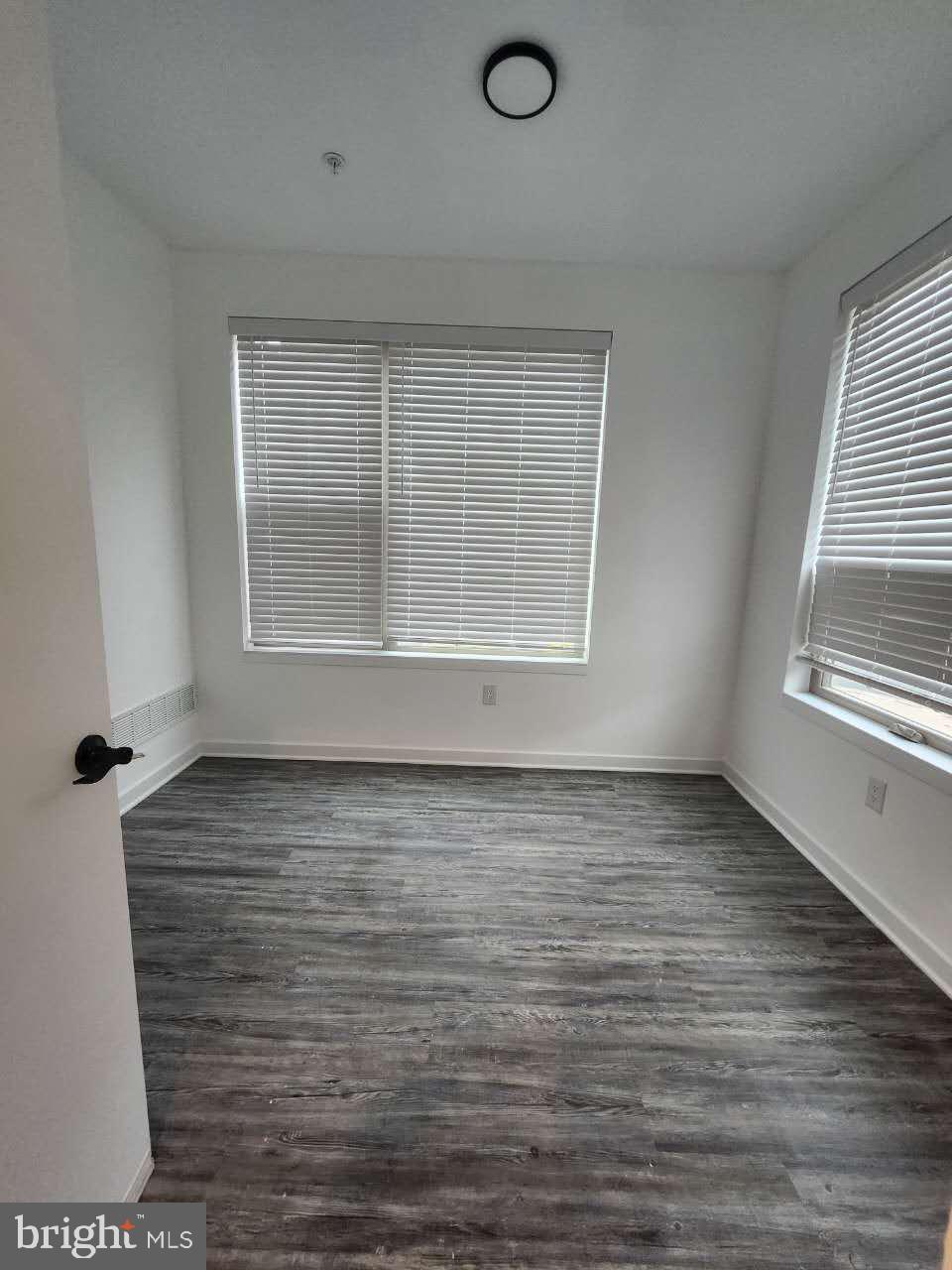 3129 Beachview Lane Philadelphia, PA 19125 - Photo 11 of 26 a view of an empty room with wooden floor and a window