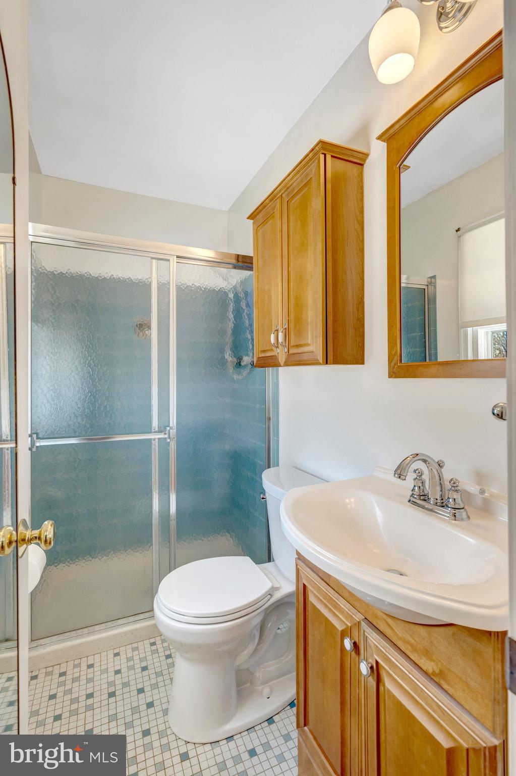 7413 Forrester Lane Manassas, VA 20109 - Photo 15 of 45 a bathroom with a sink toilet and shower