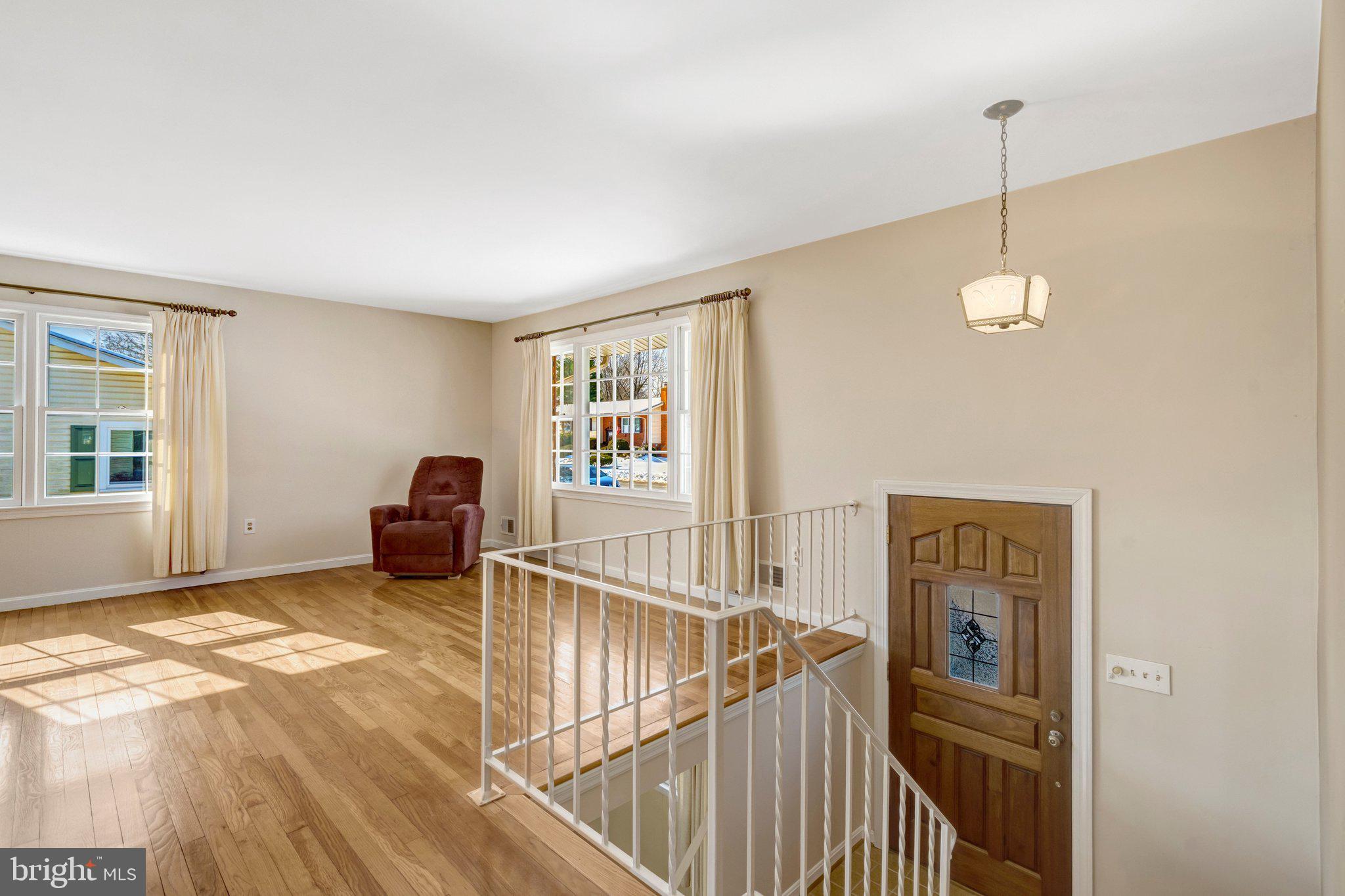 7413 Forrester Lane Manassas, VA 20109 - Photo 2 of 45 a view of a room with furniture and windows