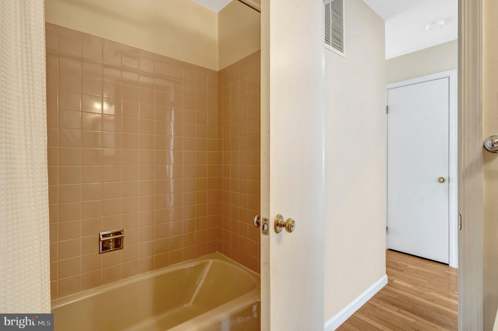 7413 Forrester Lane Manassas, VA 20109 - Photo 21 of 45 a bathroom with a bathtub