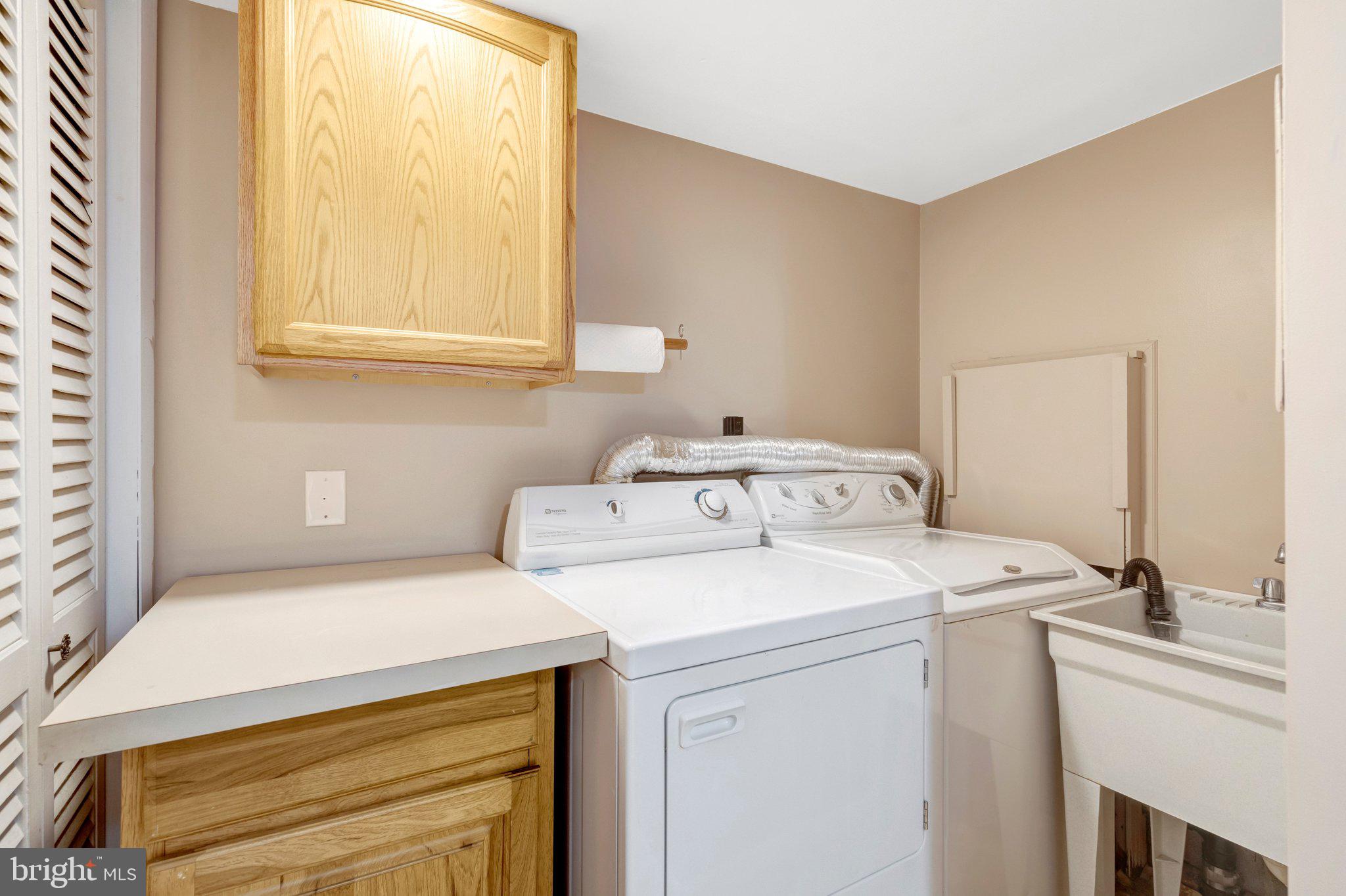 7413 Forrester Lane Manassas, VA 20109 - Photo 29 of 45 a utility room with dryer and washer