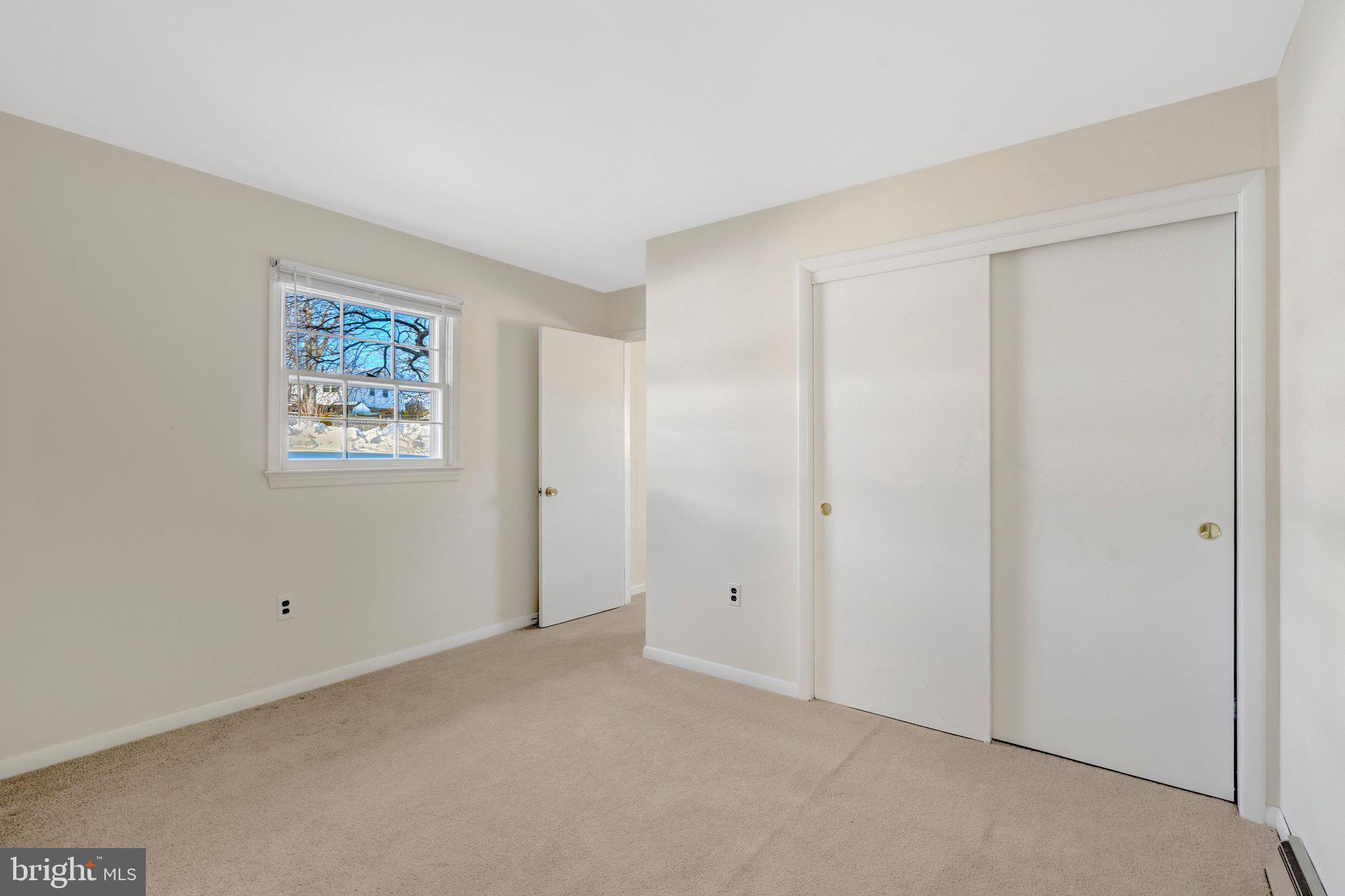 7413 Forrester Lane Manassas, VA 20109 - Photo 31 of 45 a view of an empty room with a window