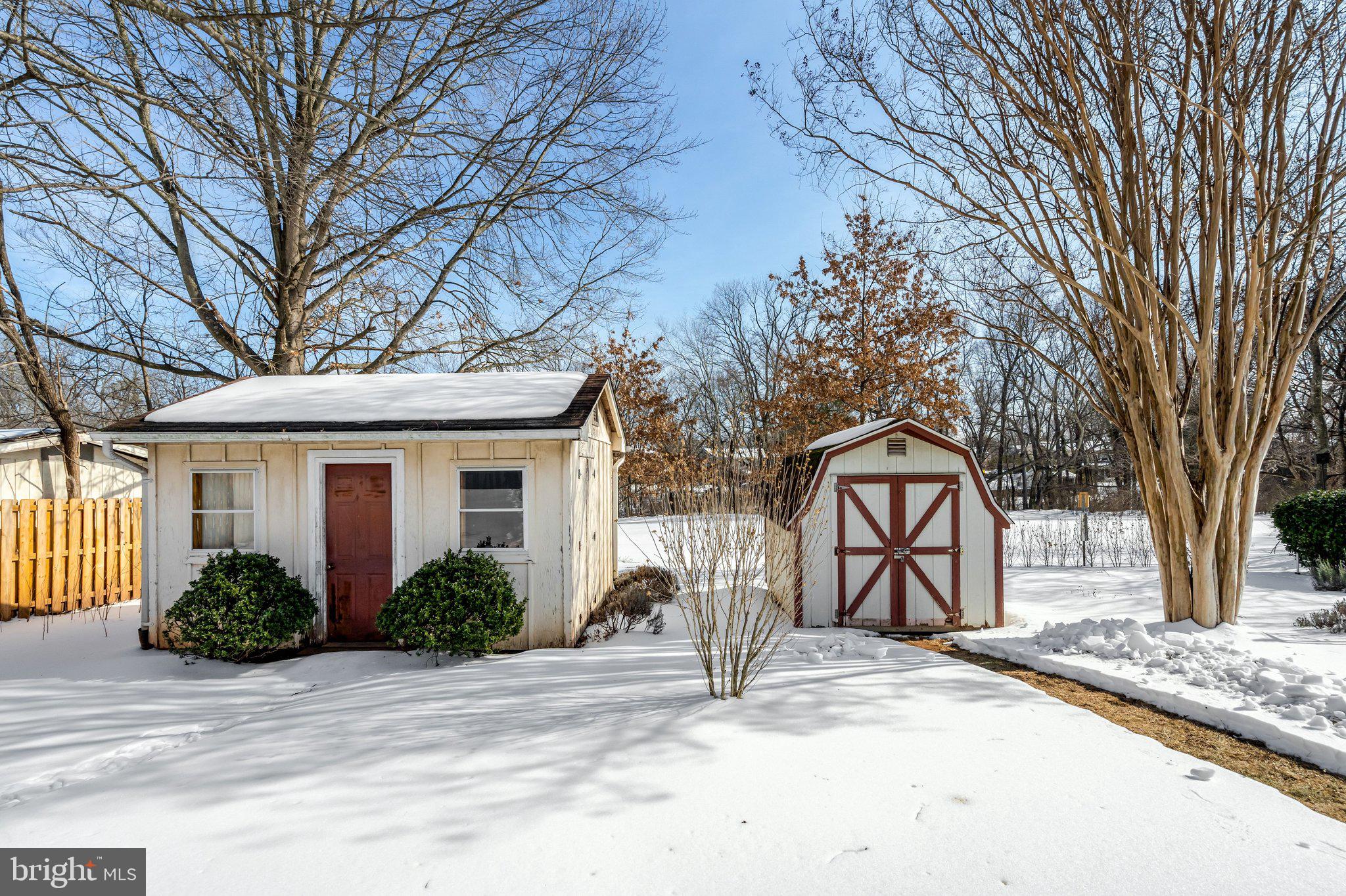 7413 Forrester Lane Manassas, VA 20109 - Photo 41 of 45 a front view of a house with garden