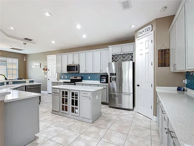 $605,000 | 2460 The Oaks Boulevard, Kissimmee, FL 34746