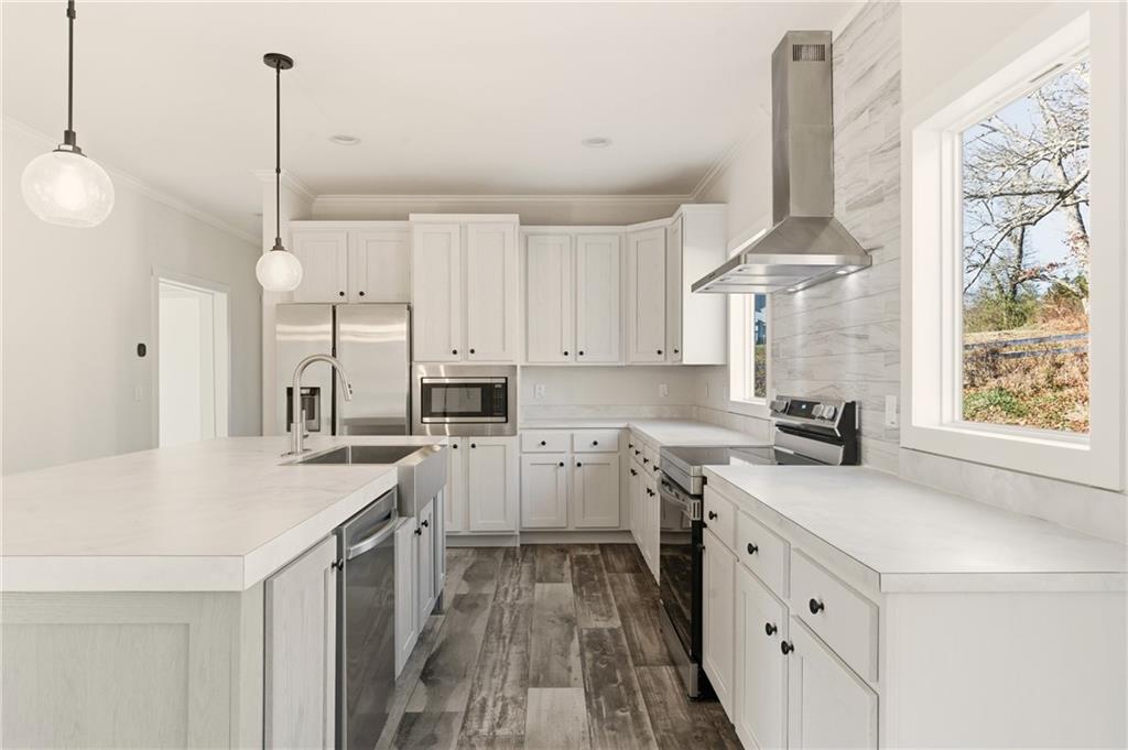 211 Loving Road Morganton, GA 30560 - Photo 19 of 34 a kitchen with appliances cabinets and a sink