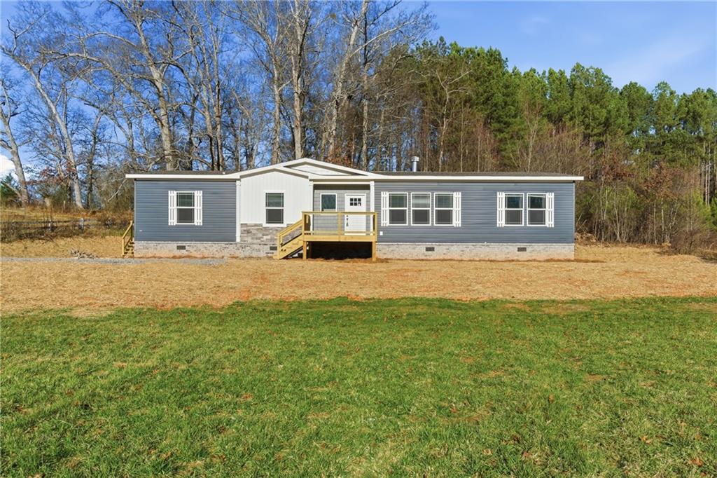 211 Loving Road Morganton, GA 30560 - Photo 2 of 34 front view of a house with a yard