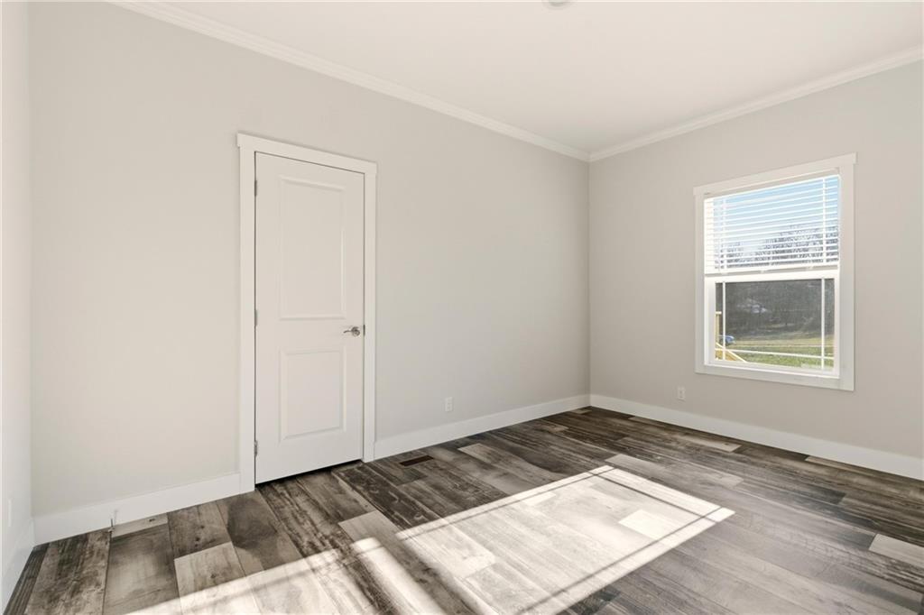 211 Loving Road Morganton, GA 30560 - Photo 23 of 34 a view of an empty room and window