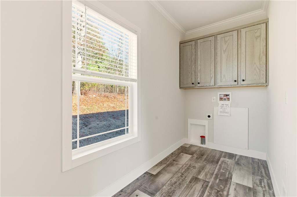 211 Loving Road Morganton, GA 30560 - Photo 31 of 34 a view of an empty room with a window