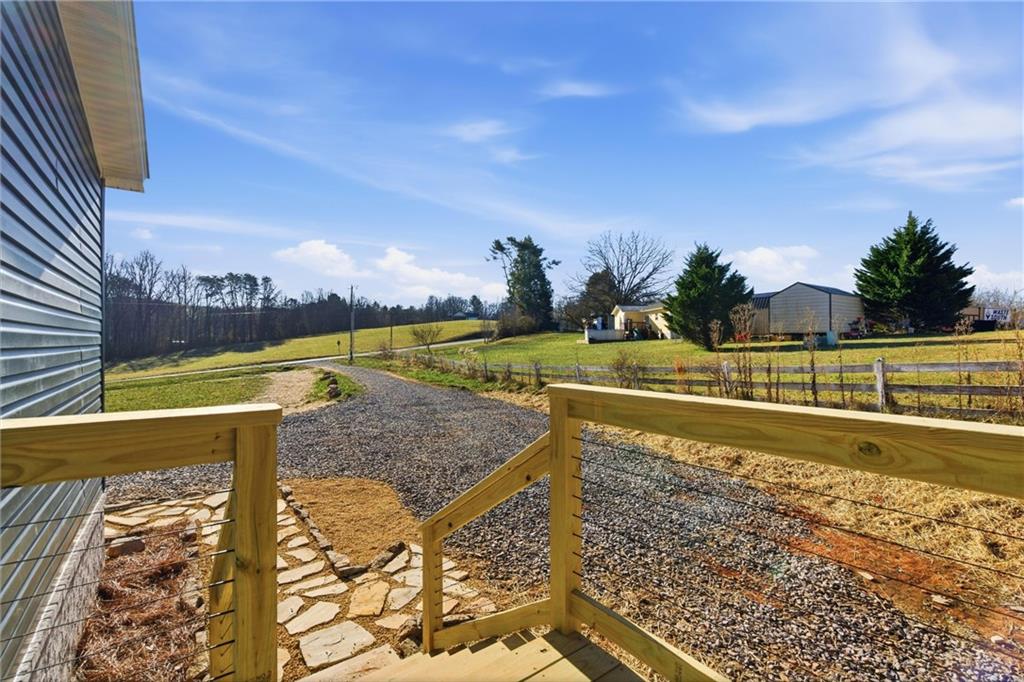 211 Loving Road Morganton, GA 30560 - Photo 33 of 34 a view of a swimming pool with an ocean view