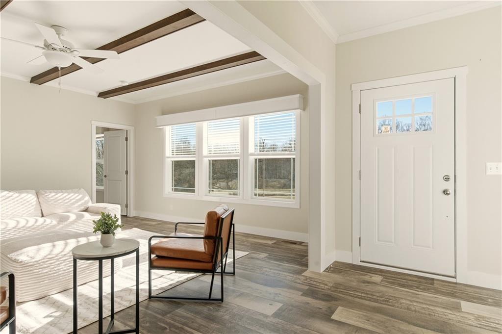 211 Loving Road Morganton, GA 30560 - Photo 6 of 34 a view of a livingroom with furniture and windows