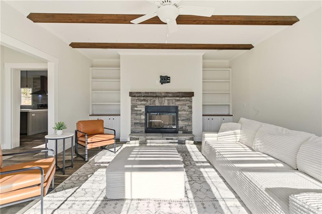 211 Loving Road Morganton, GA 30560 - Photo 8 of 34 a living room with furniture and a fireplace