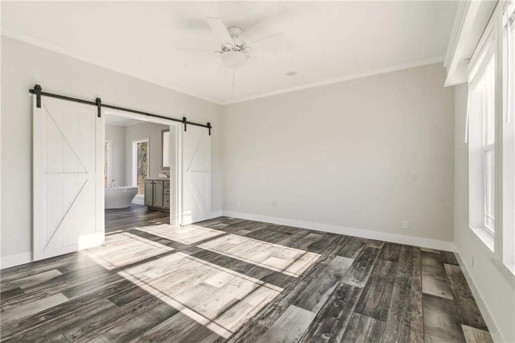 211 Loving Road Morganton, GA 30560 - Photo 9 of 34 a view of an empty room and wooden floor