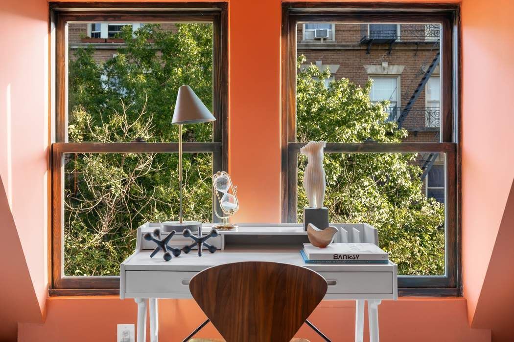 721 St Nicholas Avenue, Unit PH4 Manhattan, NY 10031 - Photo 13 of 17 a view of a window and a table chair in the balcony