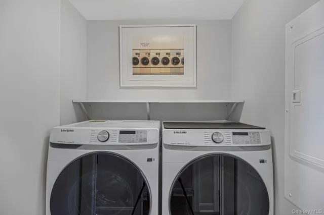 a utility room with dryer and washer