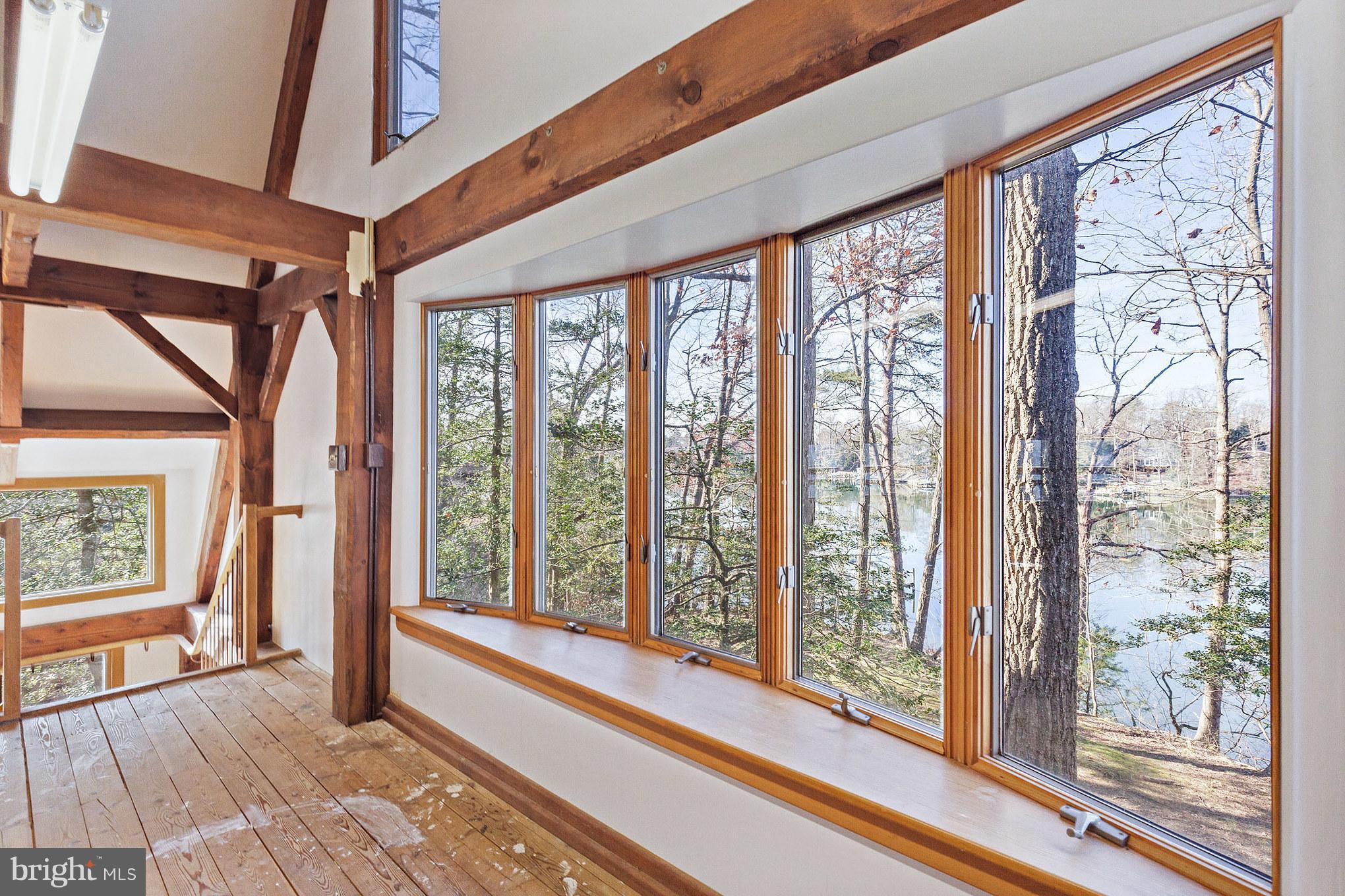1385 Crabhouse Road Lusby, MD 20657 - Photo 22 of 26 Large windows with beautiful views of the water
