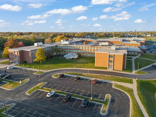 a view of a swimming pool with seating area