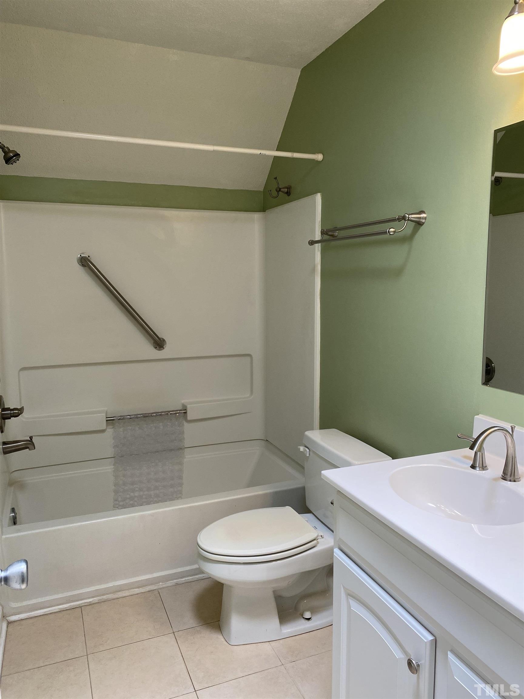 116 Baldwin Drive Durham, NC 27712 - Photo 12 of 33 a bathroom with a toilet and a shower