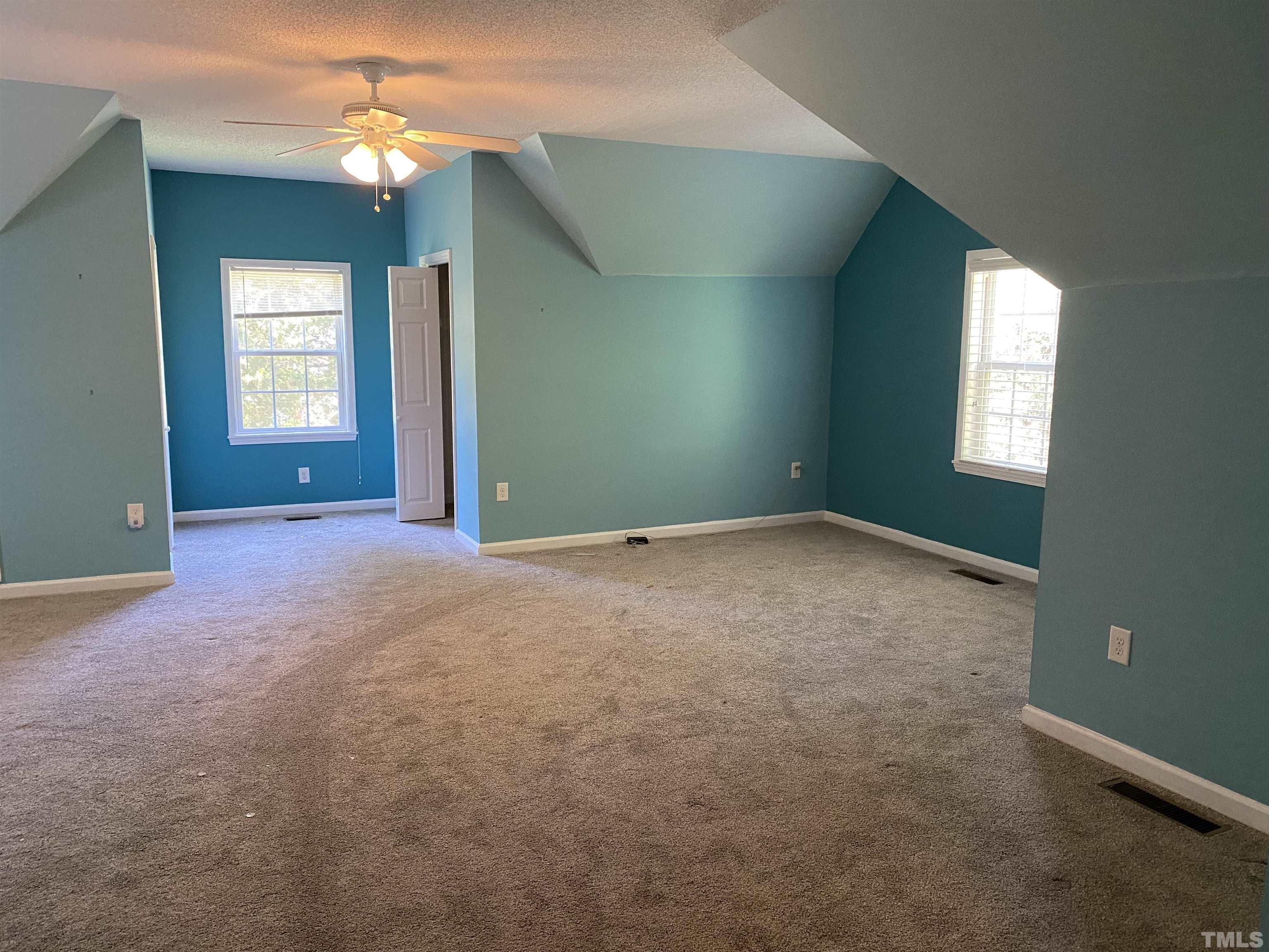 116 Baldwin Drive Durham, NC 27712 - Photo 14 of 33 an empty room with windows and closet