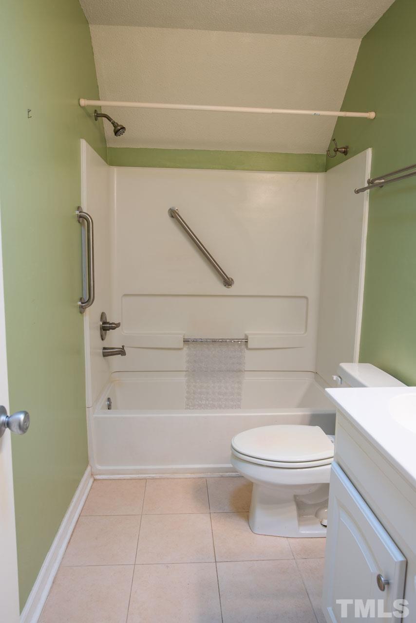 116 Baldwin Drive Durham, NC 27712 - Photo 17 of 33 a bathroom with a toilet and a shower