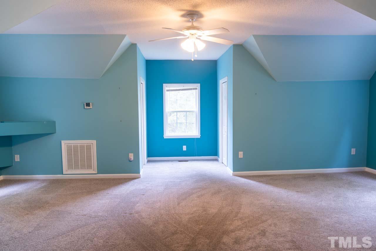 116 Baldwin Drive Durham, NC 27712 - Photo 20 of 33 a view of an empty room with a window