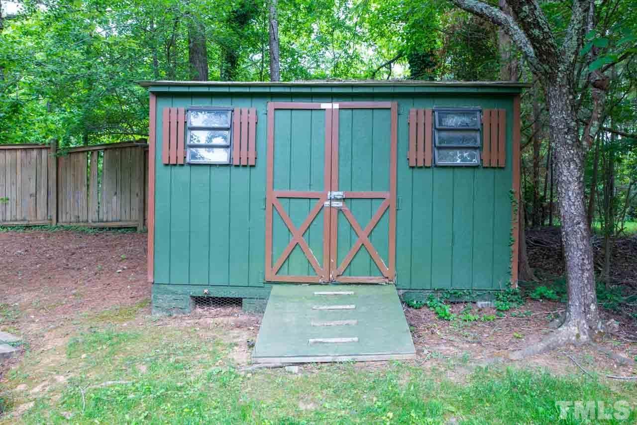 116 Baldwin Drive Durham, NC 27712 - Photo 28 of 33 a view of backyard of house with green space