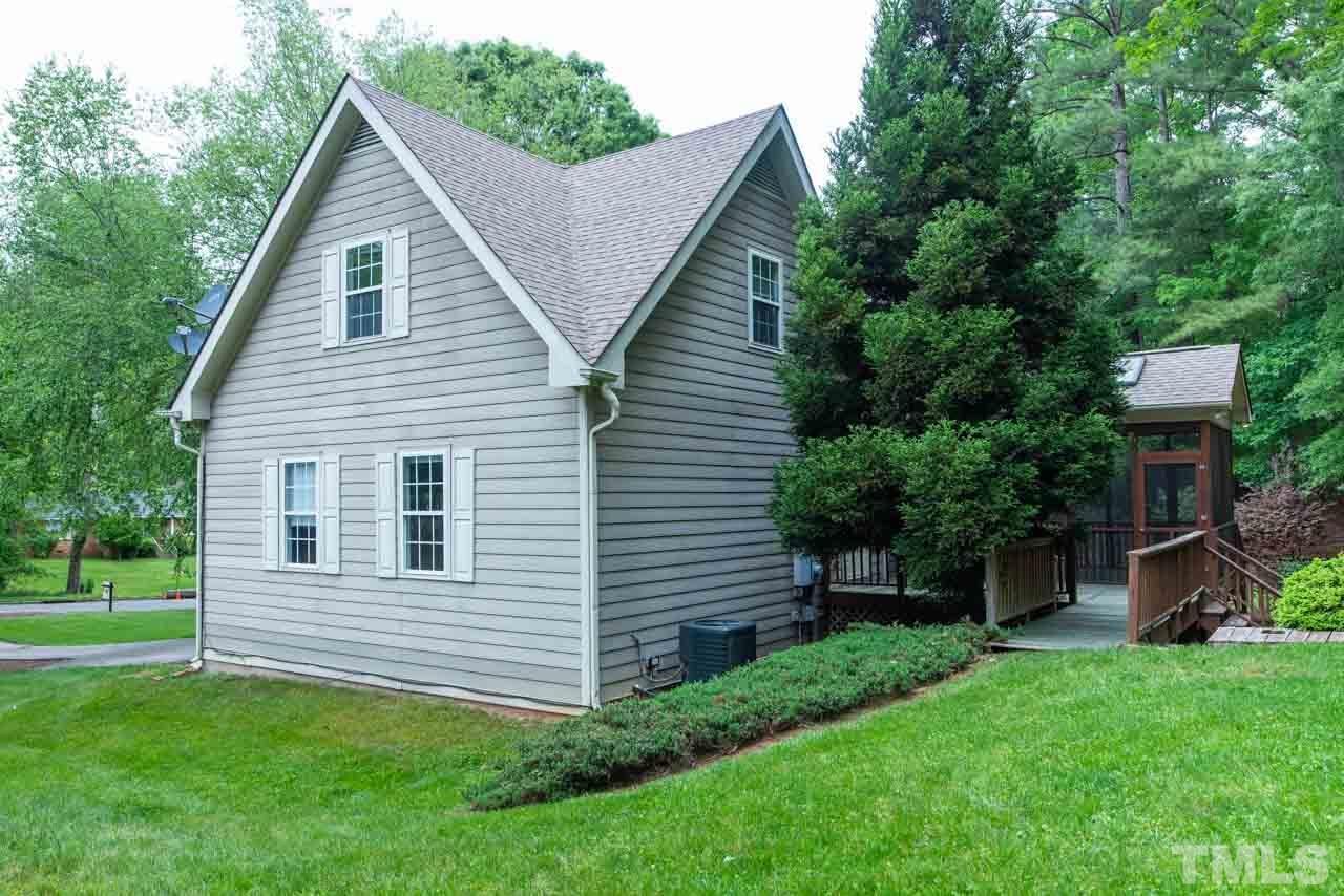 116 Baldwin Drive Durham, NC 27712 - Photo 31 of 33 a view of a house with a yard