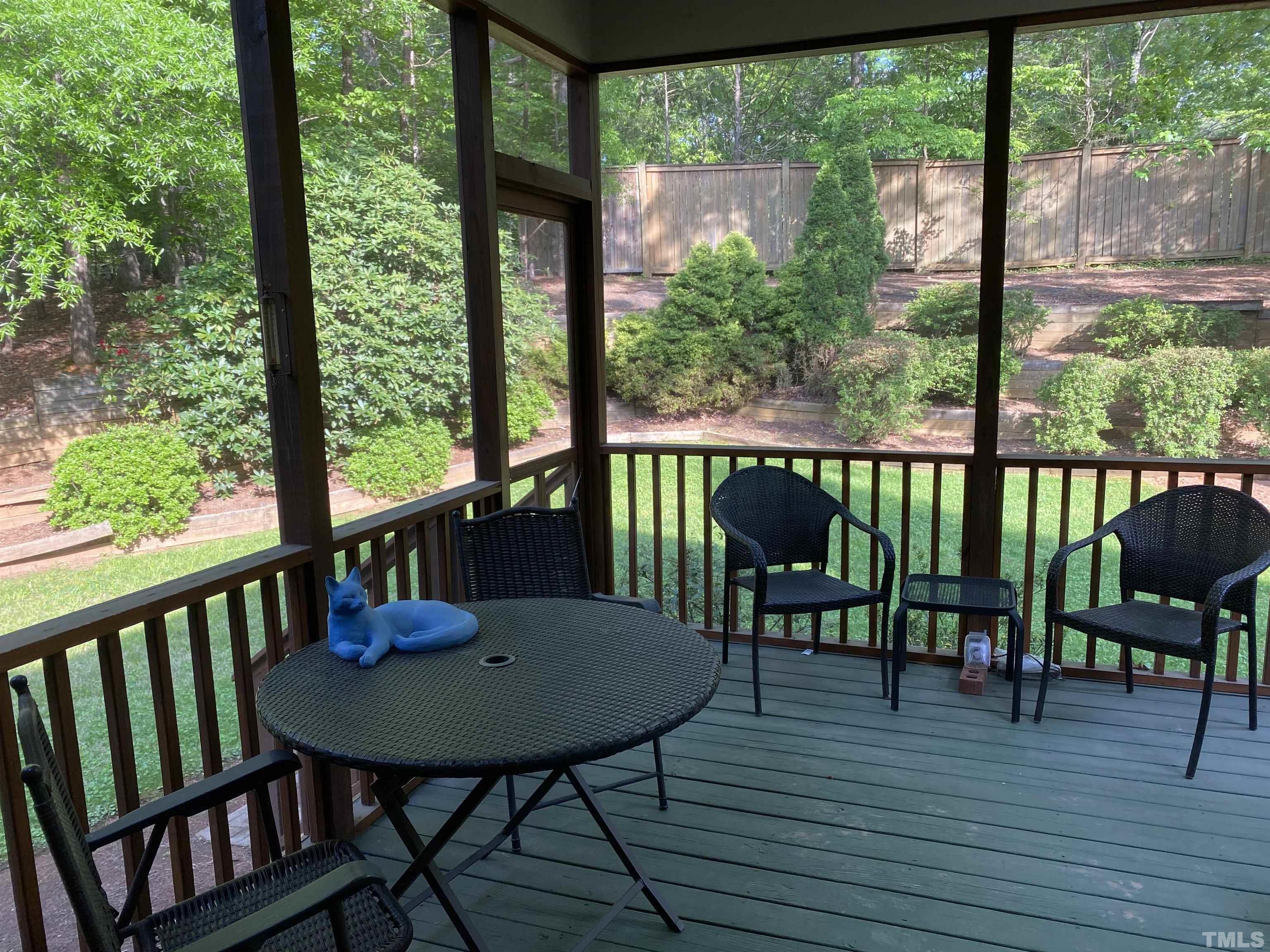 116 Baldwin Drive Durham, NC 27712 - Photo 6 of 33 a view of a two chairs and table on the deck