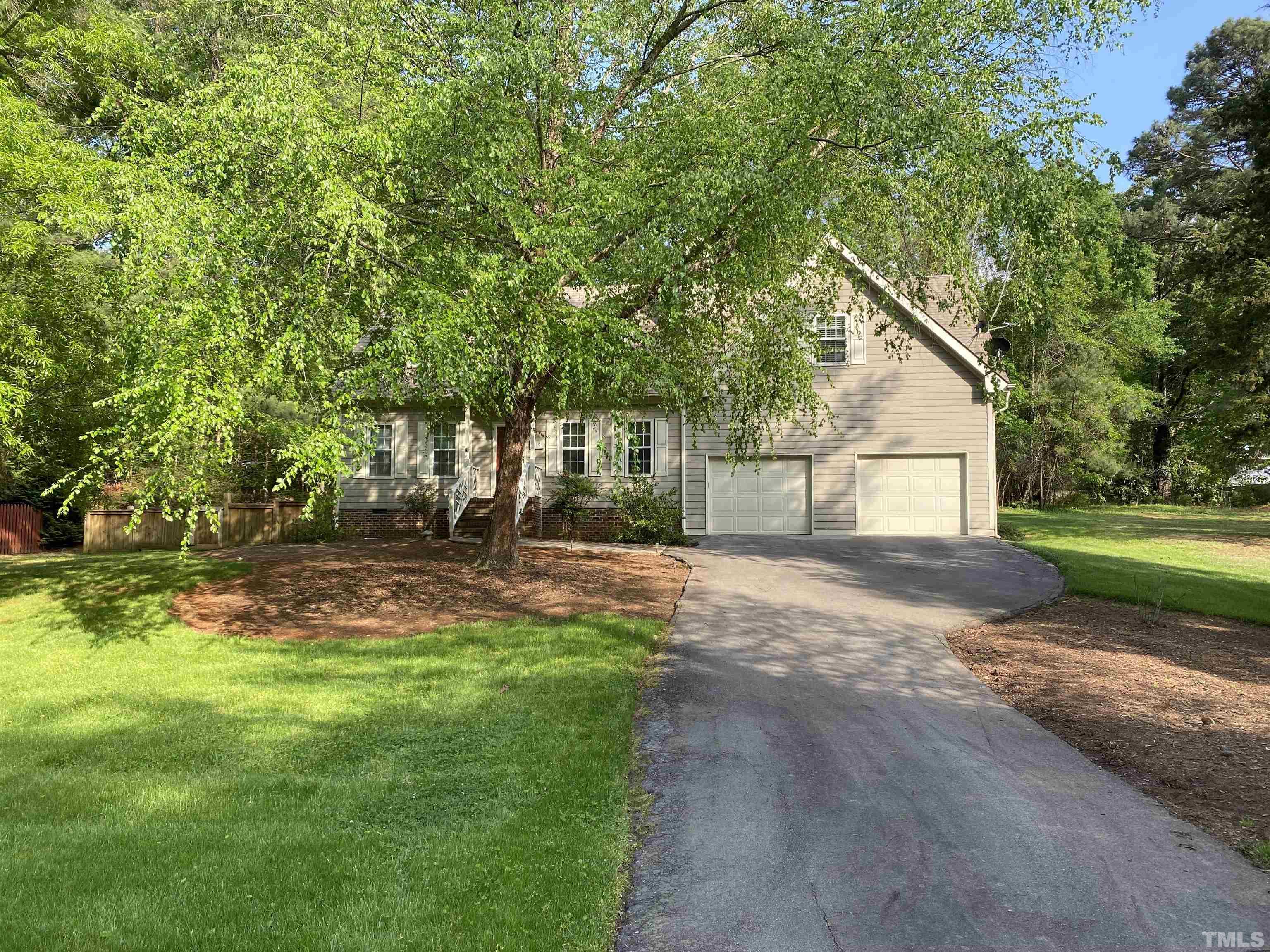 116 Baldwin Drive Durham, NC 27712 - Photo 7 of 33 a view of a house with a yard and tree s
