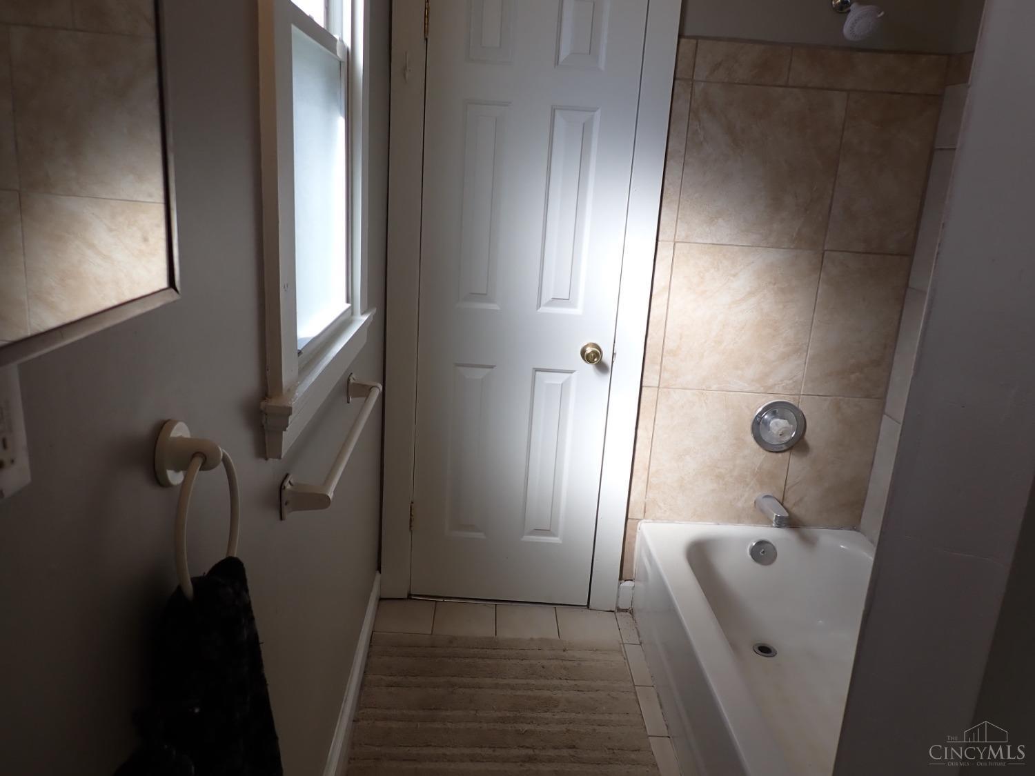 4406 East Galbraith Road Cincinnati, OH 45236 - Photo 9 of 19 First floor full Bathroom, access from Entry and first floor Bedroom.