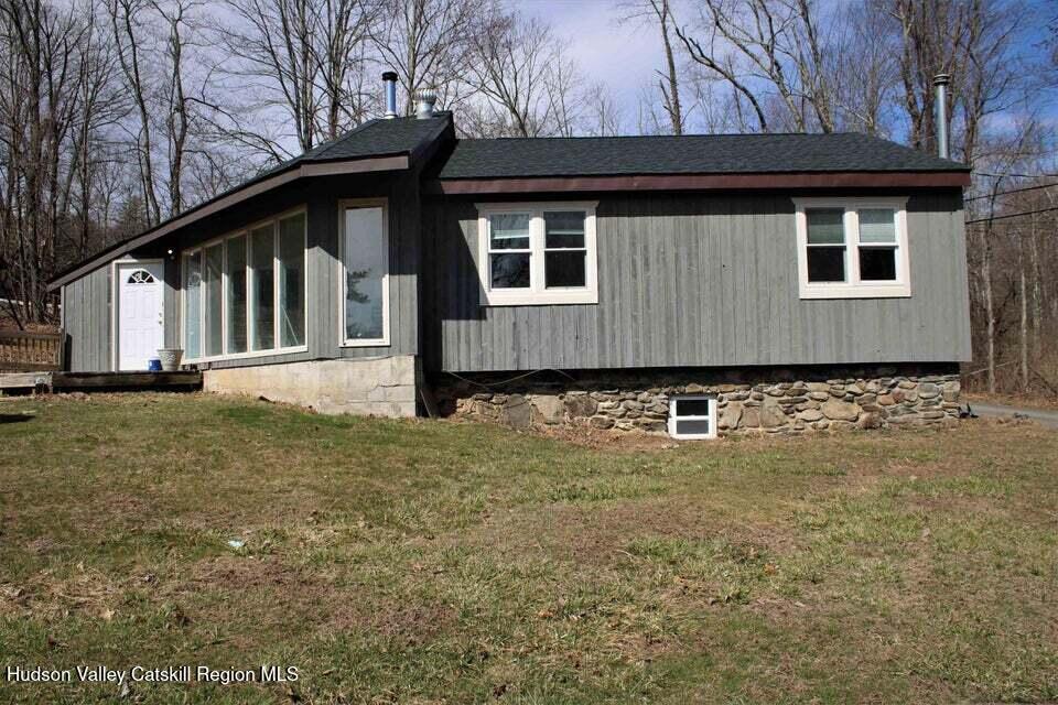119 Baker Road Kerhonkson, NY 12446 - Photo 2 of 15 a front view of a house with a yard