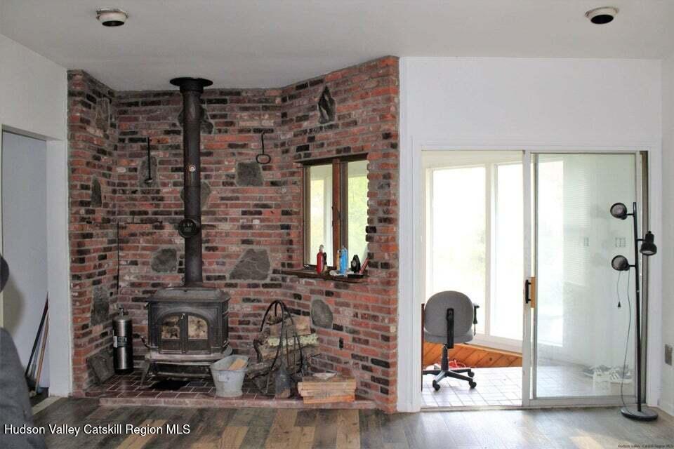 119 Baker Road Kerhonkson, NY 12446 - Photo 6 of 15 a bathroom with a bathtub and a shower